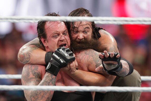 Bray Wyatt keeps his opponent The Undertaker in a hold at Wrestlemania XXXI, on Sunday, March 29, 2015 in Santa Clara, CA. 2015 marks the first year Wrestlemania will be held in the San Francisco Bay Area, being made available to viewers in 177 countries via the WWE Network. (Don Feria/AP Images for WWE)