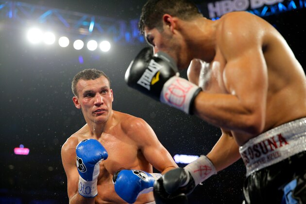 BROOMFIELD, CO - JANUARY 24:  Maxim Vlasov (L) fights against Gilberto Ramirez during a Light Heavyweight match at First Bank Center on January 24, 2015 in Broomfield, Colorado. Ramirez won by unanimous decision. (Photo by Justin Edmonds/Getty Images)