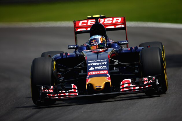 SAO PAULO, BRAZIL - NOVEMBER 14:  Carlos Sainz of Spain and Scuderia Toro Rosso drives during qualifying for the Formula One Grand Prix of Brazil at Autodromo Jose Carlos Pace on November 14, 2015 in Sao Paulo, Brazil.  (Photo by Clive Mason/Getty Images)