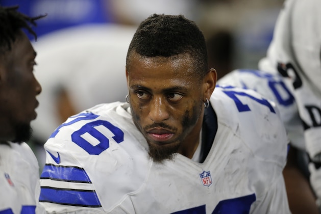 Dallas Cowboys' Greg Hardy (76) talks with teammates on the bench in the second half of an NFL football game against the Philadelphia Eagles on Sunday, Nov. 8, 2015, in Arlington, Texas. (AP Photo/Brandon Wade)