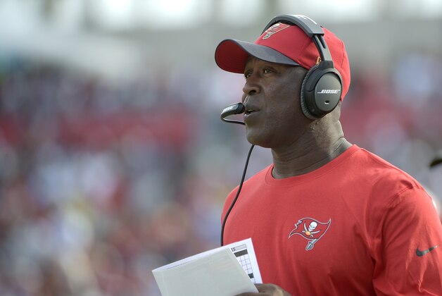 Tampa Bay Buccaneers head coach Lovie Smith watches from the sideline during the second half of an NFL football game against the Dallas Cowboys in Tampa, Fla., Sunday, Nov. 15, 2015. The Buccaneers won 10-6. (AP Photo/Phelan M. Ebenhack)