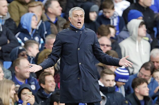 Chelsea manager Jose Mourinho gestures during the English Premier League soccer match between Chelsea and Norwich City at Stamford Bridge stadium in London, Saturday, Nov. 21, 2015. (AP Photo/Frank Augstein)