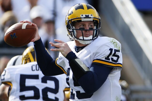 Michigan quarterback Jake Rudock (15) passes during the first half of an NCAA college football game in State College, Pa., Saturday, Nov. 21, 2015. (AP Photo/Gene J. Puskar)