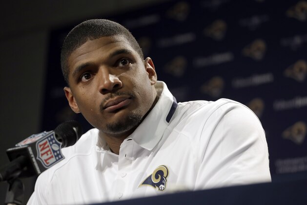 St. Louis Rams seventh-round draft pick Michael Sam speaks during a news conference at the NFL football team's practice facility Tuesday, May 13, 2014, in St. Louis. (AP Photo/Jeff Roberson)