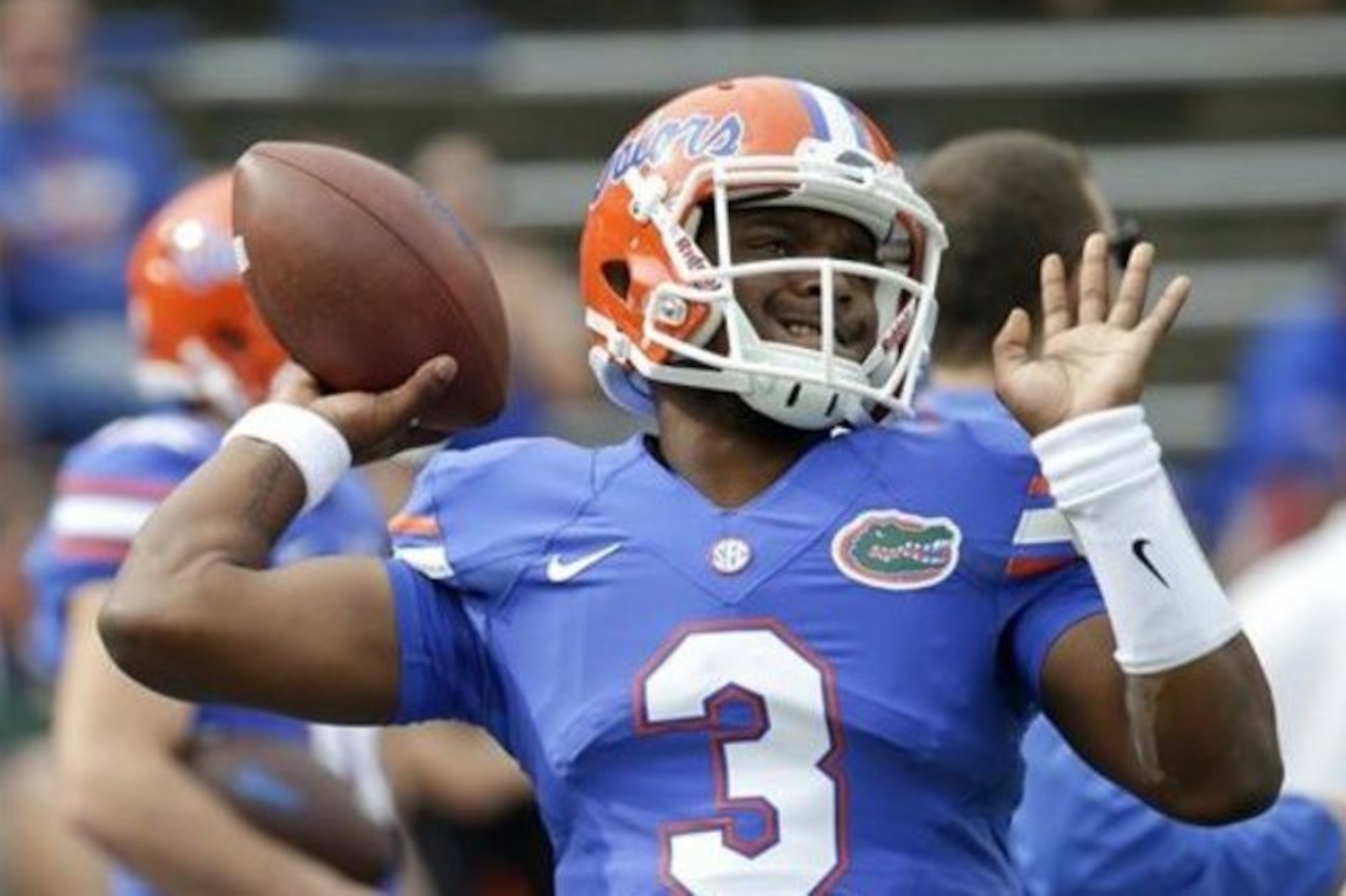 Florida quarterback Treon Harris warms up before an NCAA college football game against Florida Atlantic, Saturday, Nov. 21, 2015, in Gainesville, Fla. (AP Photo/John Raoux)