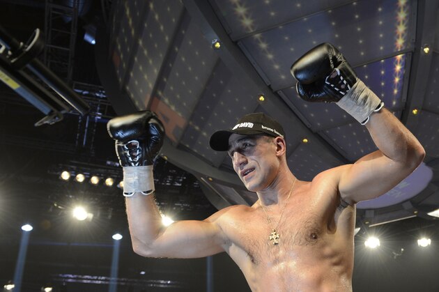 Armenian-German super middleweight boxer Arthur Abraham celebrates victiory over French challenger Mehdi Bouadla after the WBO Super-middleweight title boxing match in Nuremberg, southern Germany on December 15, 2012. Abraham won the fight in the 8th round.  AFP PHOTO / CHRISTOF STACHE        (Photo credit should read CHRISTOF STACHE/AFP/Getty Images)
