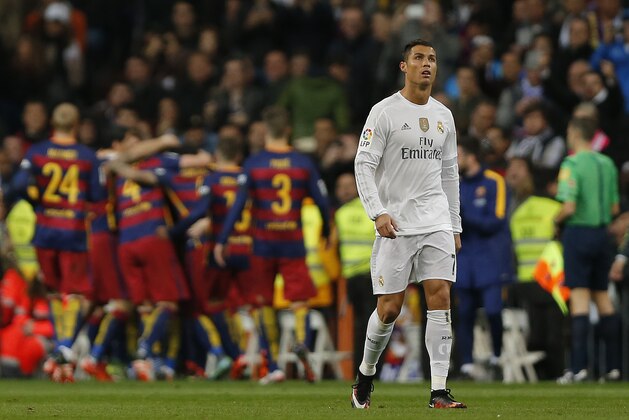 Real Madrid's Cristiano Ronaldo reacts after Barcelona scored a goal during the first clasico of the season between Real Madrid and Barcelona at the Santiago Bernabeu stadium in Madrid, Spain, Saturday, Nov. 21, 2015. (AP Photo/Daniel Ochoa de Olza)