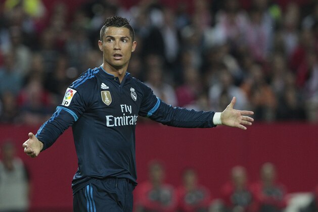 Real Madrid's Cristiano Ronaldo gestures during their La Liga soccer match against Sevilla at the Ramon Sanchez Pizjuan stadium, in Seville, Spain on Sunday, Nov. 8, 2015. (AP Photo/Angel Fernandez)