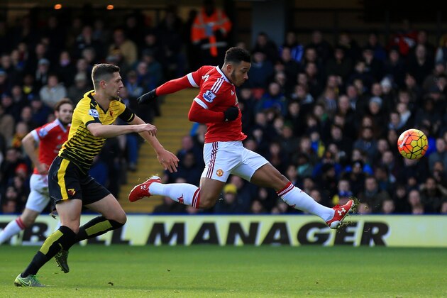 WATFORD, ENGLAND - NOVEMBER 21:  Memphis Depay of Manchester United scores his team's first goal during the Barclays Premier League match between Watford and Manchester United at Vicarage Road on November 21, 2015 in Watford, England.  (Photo by Stephen Pond/Getty Images)