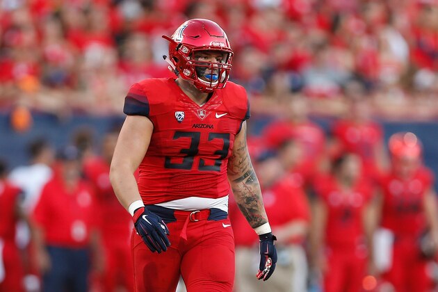 TUCSON, AZ - SEPTEMBER 26:  Linebacker Scooby Wright III #33 of the Arizona Wildcats walks on the field during the first quarter of the college football game against the UCLA Bruins at Arizona Stadium on September 26, 2015 in Tucson, Arizona.  (Photo by Christian Petersen/Getty Images)
