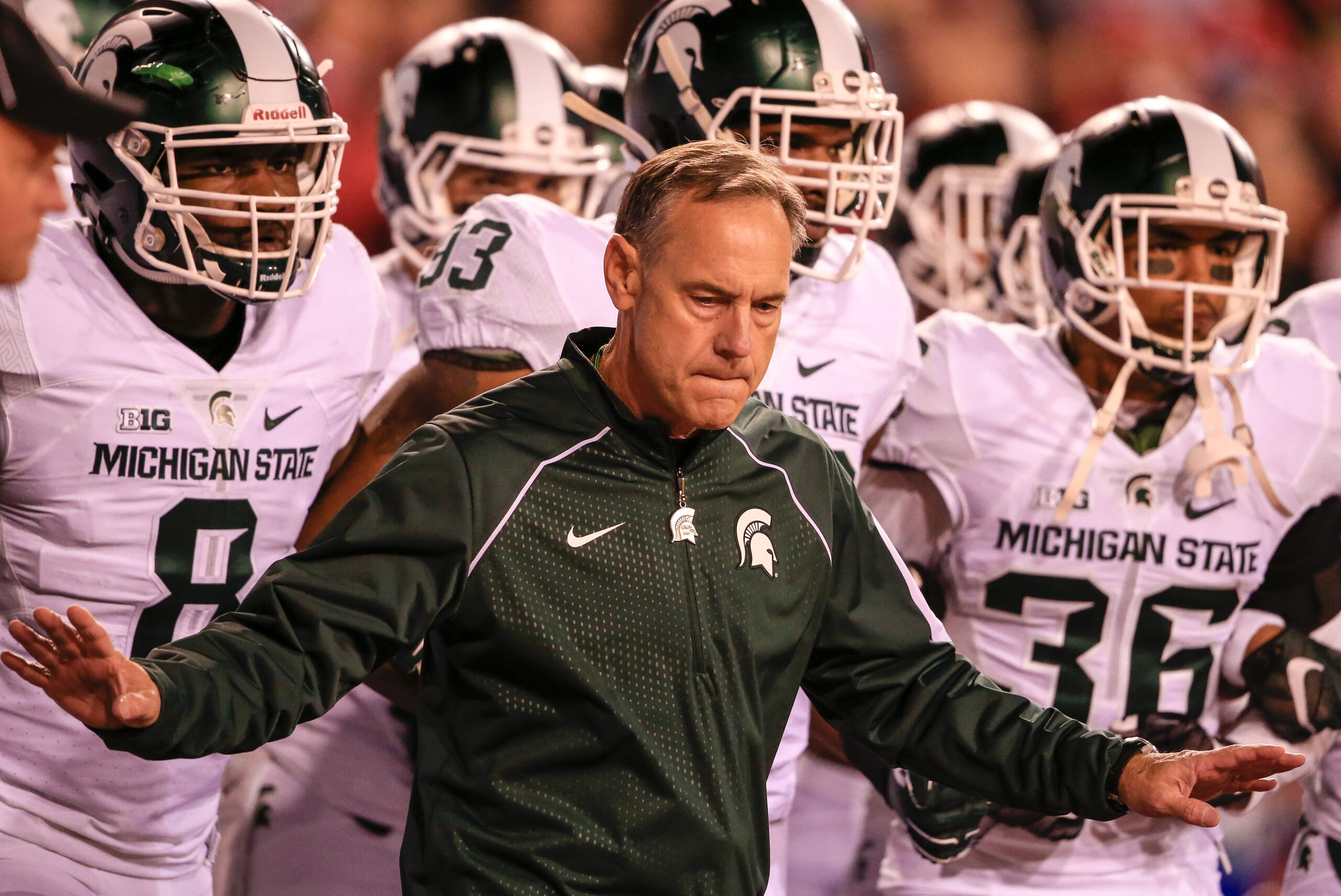 Michigan State head coach Mark Dantonio holds back his players from taking the field before an NCAA college football game against Nebraska in Lincoln, Neb., Saturday, Nov. 7, 2015. Nebraska won 39-38. (AP Photo/Nati Harnik) Michigan State head coach Mark Dantonio holds back his players from taking the field before an NCAA college football game against Nebraska in Lincoln, Neb., Saturday, Nov. 7, 2015. Nebraska won 39-38. (AP Photo/Nati Harnik)