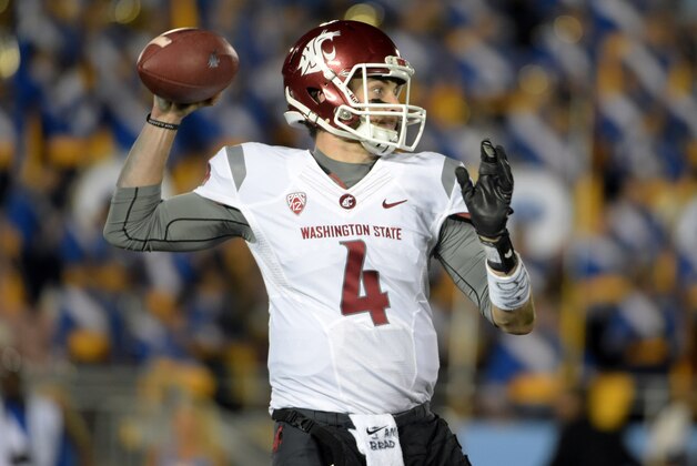 Nov 14, 2015; Pasadena, CA, USA; Washington State Cougars quarterback Luke Falk (4) throws a pass against the UCLA Bruins in a NCAA football game at Rose Bowl. Mandatory Credit: Kirby Lee-USA TODAY Sports