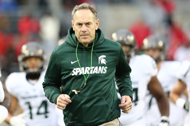 COLUMBUS, OH - NOVEMBER 21: Head coach Mark Dantonio of the Michigan State Spartans leads his team on to the field before the start of the game against Ohio State Buckeyes at Ohio Stadium on November 21, 2015 in Columbus, Ohio. (Photo by Rey Del Rio/Getty Images)