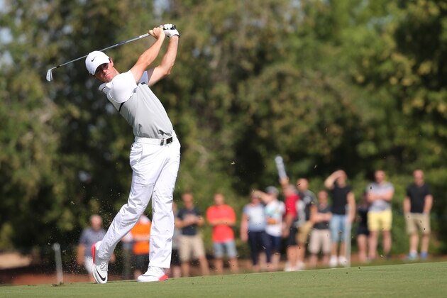 Rory McIlroy of Northern Ireland plays a shot on the 2nd hole during the final round of the DP World Tour Championship golf tournament in Dubai, United Arab Emirates, Sunday, Nov. 22, 2015. (AP Photo/Kamran Jebreili)