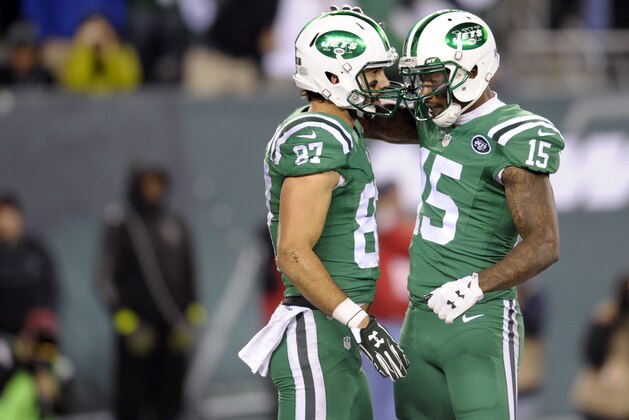 New York Jets wide receiver Eric Decker (87) and wide receiver Brandon Marshall (15) celebrate Decker's touchdown catch against the Buffalo Bills during the second half of an NFL football game, Thursday, Nov. 12, 2015, in East Rutherford, N.J. (AP Photo/Bill Kostroun)
