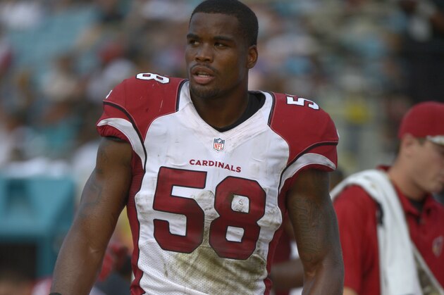 Arizona Cardinals inside linebacker Daryl Washington (58) walks in front of the bench during the second half of an NFL football game against the Jacksonville Jaguars in Jacksonville, Fla., Sunday, Nov. 17, 2013.(AP Photo/Phelan M. Ebenhack)