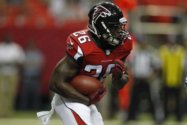 Sep 3, 2015; Atlanta, GA, USA; Atlanta Falcons running back Tevin Coleman (26) runs the ball against the Baltimore Ravens in the first quarter at the Georgia Dome. Mandatory Credit: Brett Davis-USA TODAY Sports