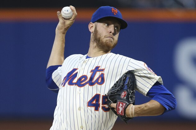 New York Mets starting pitcher Zack Wheeler (45) throws in the first inning of a baseball game against the Atlanta Braves, Wednesday, Aug. 27, 2014, in New York. (AP Photo/John Minchillo)