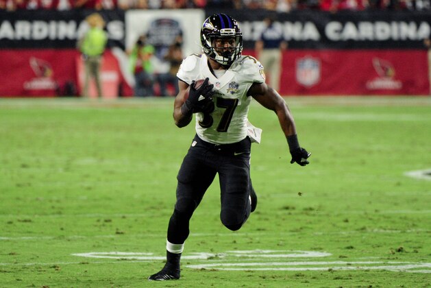 Oct 26, 2015; Glendale, AZ, USA; Baltimore Ravens running back Javorius Allen (37) runs with the ball after a catch in the first half against the Arizona Cardinals at University of Phoenix Stadium. Mandatory Credit: Matt Kartozian-USA TODAY Sports