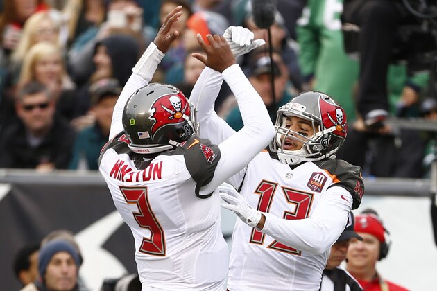 PHILADELPHIA, PA - NOVEMBER 22: Mike Evans #13 of the Tampa Bay Buccaneers celebrates his touchdown with teammate Jameis Winston #3 in the first quarter against the Philadelphia Eagles at Lincoln Financial Field on November 22, 2015 in Philadelphia, Pennsylvania.  (Photo by Rich Schultz/Getty Images)
