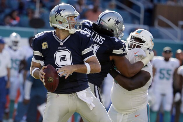 Dallas Cowboys quarterback Tony Romo (9) looks to pass during the second half of an NFL football game against the Miami Dolphins, Sunday, Nov. 22, 2015, in Miami Gardens, Fla.  (AP Photo/Lynne Sladky)