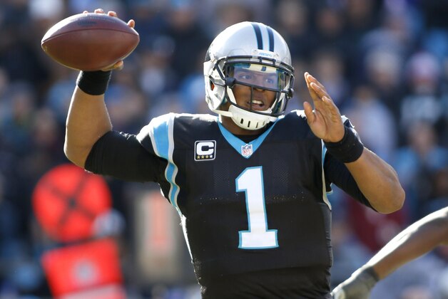 Carolina Panthers' Cam Newton (1) looks to pass against the Washington Redskins in the first half of an NFL football game in Charlotte, N.C., Sunday, Nov. 22, 2015. (AP Photo/Bob Leverone)