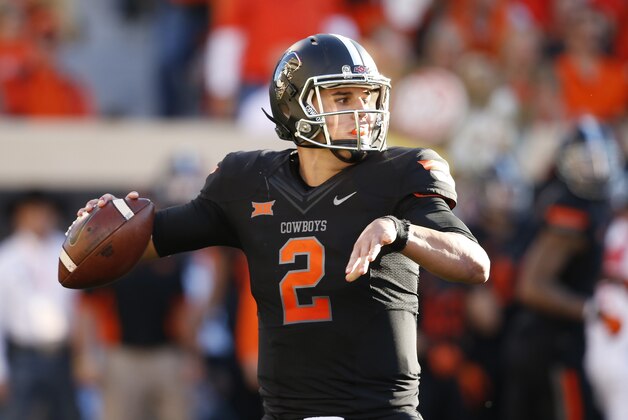 Oklahoma State quarterback Mason Rudolph (2) is pictured during an NCAA college football game between TCU and Oklahoma State in Stillwater, Okla., Saturday, Nov. 7, 2015. Oklahoma State won 49-29. (AP Photo/Sue Ogrocki)