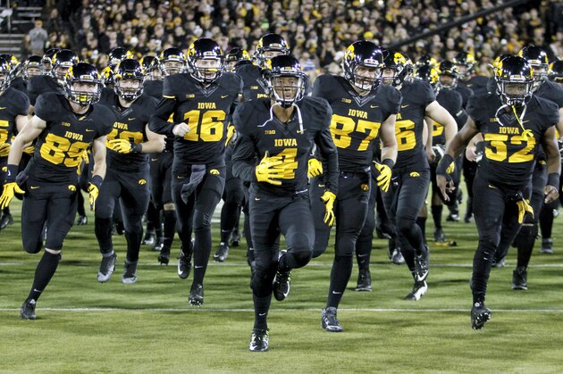IOWA CITY, IA - NOVEMBER 14: Wide receiver Tevaun Smith #4 of the Iowa Hawkeyes takes the field before the match-up against the Minnesota Gophers on November 14, 2015 at Kinnick Stadium, in Iowa City, Iowa. (Photo by Matthew Holst/Getty Images)