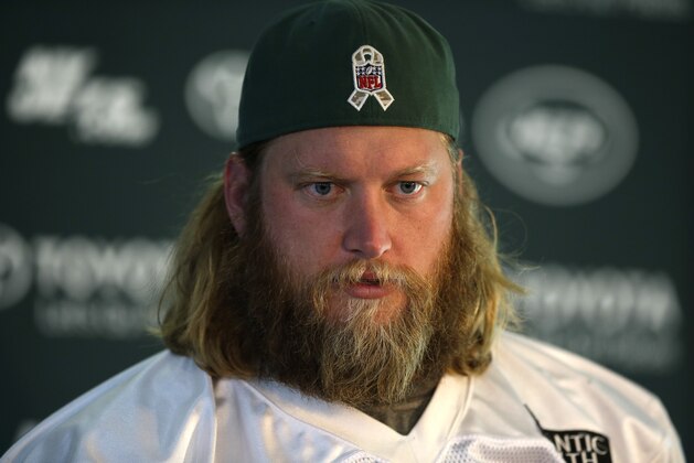 New York Jets center Nick Mangold gives a press conference after an NFL training session at London Irish training ground in south west London, Friday, Oct. 2, 2015. The New York Jets are preparing for an NFL football game against the Miami Dolphins at London's Wembley stadium on Sunday. (AP Photo/Matt Dunham)