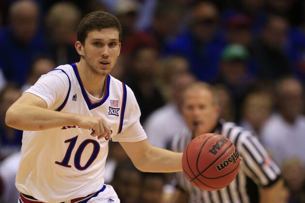 Kansas guard Sviatoslav Mykhailiuk (10) during the first half of an exhibition NCAA college basketball game against Pittsburg State in Lawrence, Kan., Wednesday, Nov. 4, 2015. (AP Photo/Orlin Wagner)