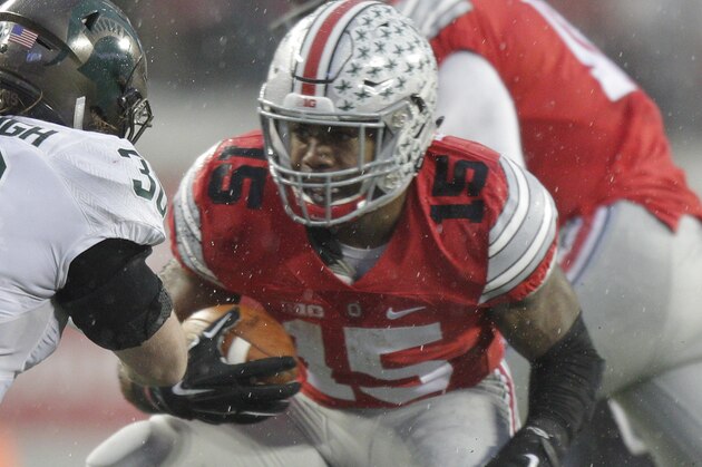 Ohio State running back Ezekiel Elliott plays plays against Michigan State during an NCAA college football game Saturday, Nov. 21, 2015, in Columbus, Ohio. (AP Photo/Jay LaPrete)