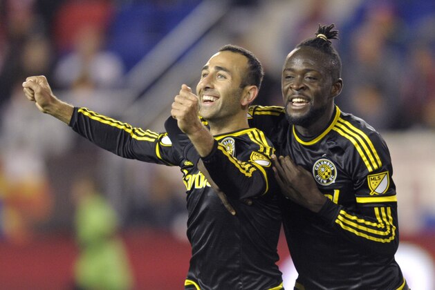 Columbus Crew Justin Meram, left, celebrates with Kei Kamara after Meram scored a goal during the first half of an MLS soccer match against the New York Red Bulls, Saturday, Oct. 3, 2015, in Harrison, N.J. (AP Photo/Bill Kostroun)