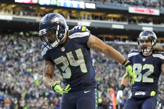 Seattle Seahawks running back Thomas Rawls (34) takes a bow after he scored a touchdown against the San Francisco 49ers in the second half of an NFL football game, Sunday, Nov. 22, 2015, in Seattle. (AP Photo/John Froschauer)