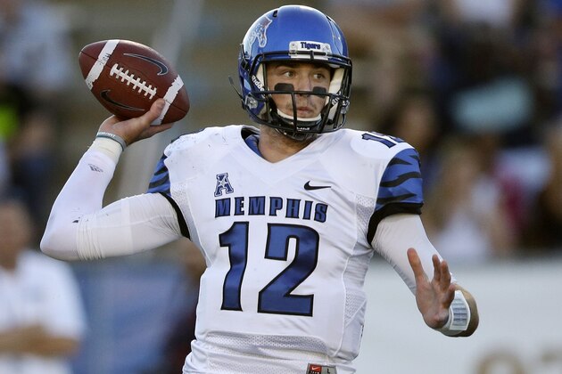 Memphis quarterback Paxton Lynch looks for a receiver in the first quarter of an NCAA college football game against Middle Tennessee on Saturday, Sept. 14, 2013, in Murfreesboro, Tenn. (AP Photo/Mark Humphrey)