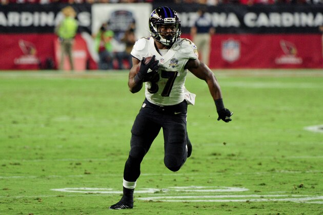 Oct 26, 2015; Glendale, AZ, USA; Baltimore Ravens running back Javorius Allen (37) runs with the ball after a catch in the first half against the Arizona Cardinals at University of Phoenix Stadium. Mandatory Credit: Matt Kartozian-USA TODAY Sports