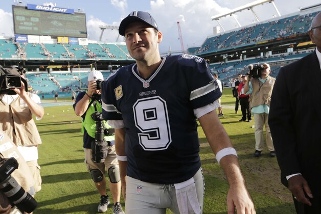 Dallas Cowboys quarterback Tony Romo (9) leaves the field at the end of an NFL football game against the Miami Dolphins, Sunday, Nov. 22, 2015, in Miami Gardens, Fla. The Cowboys defeated the Dolphins 24-14.  (AP Photo/Lynne Sladky)