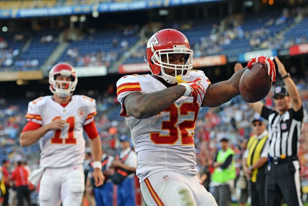 Nov 22, 2015; San Diego, CA, USA; Kansas City Chiefs running back Spencer Ware (32) celebrates a touchdown as quarterback Alex Smith (11) looks on during the fourth quarter against the San Diego Chargers at Qualcomm Stadium. Mandatory Credit: Jake Roth-USA TODAY Sports