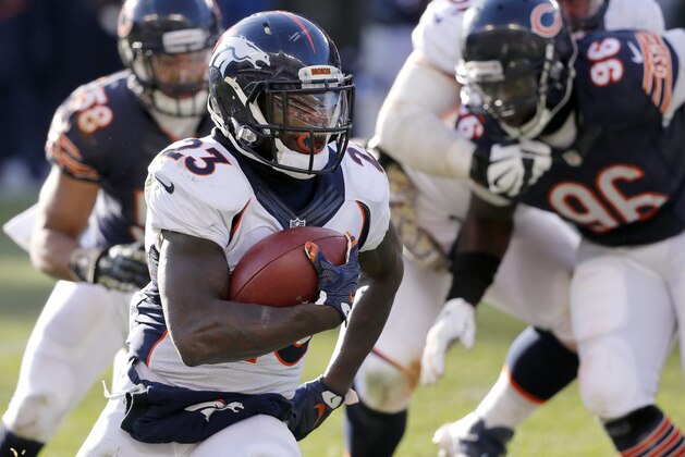Denver Broncos running back Ronnie Hillman (23) runs the ball during the second half of an NFL football game against the Chicago Bears, Sunday, Nov. 22, 2015, in Chicago. (AP Photo/Charles Rex Arbogast)