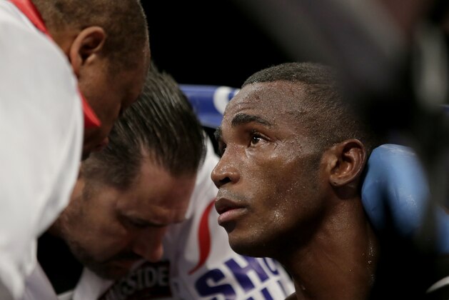 Erislandy Lara, of Cuba, sits in his corner during a super welterweight fight against Canelo Alvarez, Saturday, July 12, 2014, in Las Vegas. (AP Photo/John Locher)