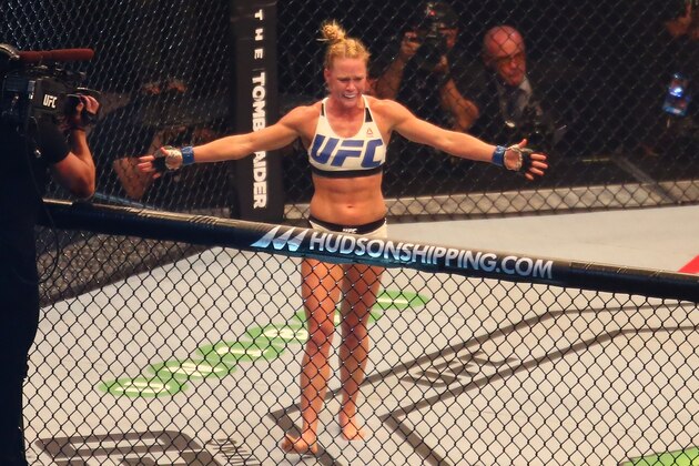 MELBOURNE, AUSTRALIA - NOVEMBER 15:  New UFC women's bantamweight champion Holly Holm of the United States celebrates her victory over Ronda Rousey of the United States in their UFC women's bantamweight championship bout during the UFC 193 event at Etihad Stadium on November 15, 2015 in Melbourne, Australia.  (Photo by Scott Barbour /Zuffa LLC/Zuffa LLC via Getty Images)