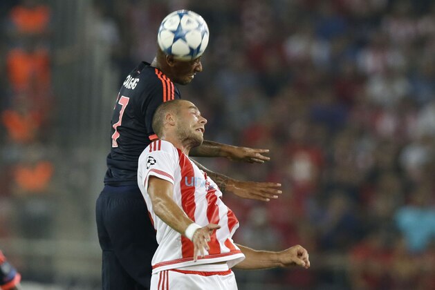Bayern's Jerome Boateng, left, and Olympiakos' Pajtim Kasami go for a header during the Champions League Group F soccer match between Olympiakos and Bayern Munich at Georgios Karaiskakis stadium in Piraeus port, near Athens, Wednesday, Sept. 16, 2015. (AP Photo/Thanassis Stavrakis) Bayern's Jerome Boateng, left, and Olympiakos' Pajtim Kasami go for a header during the Champions League Group F soccer match between Olympiakos and Bayern Munich at Georgios Karaiskakis stadium in Piraeus port, near Athens, Wednesday, Sept. 16, 2015. (AP Photo/Thanassis Stavrakis)