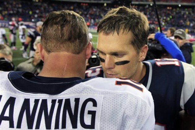 Denver Broncos quarterback Peyton Manning, left, and New England Patriots quarterback Tom Brady, right, meet after the Patriots' 31-21 win in their NFL football game, Sunday, Oct. 7, 2012, in Foxborough, Mass. (AP Photo/Steven Senne)
