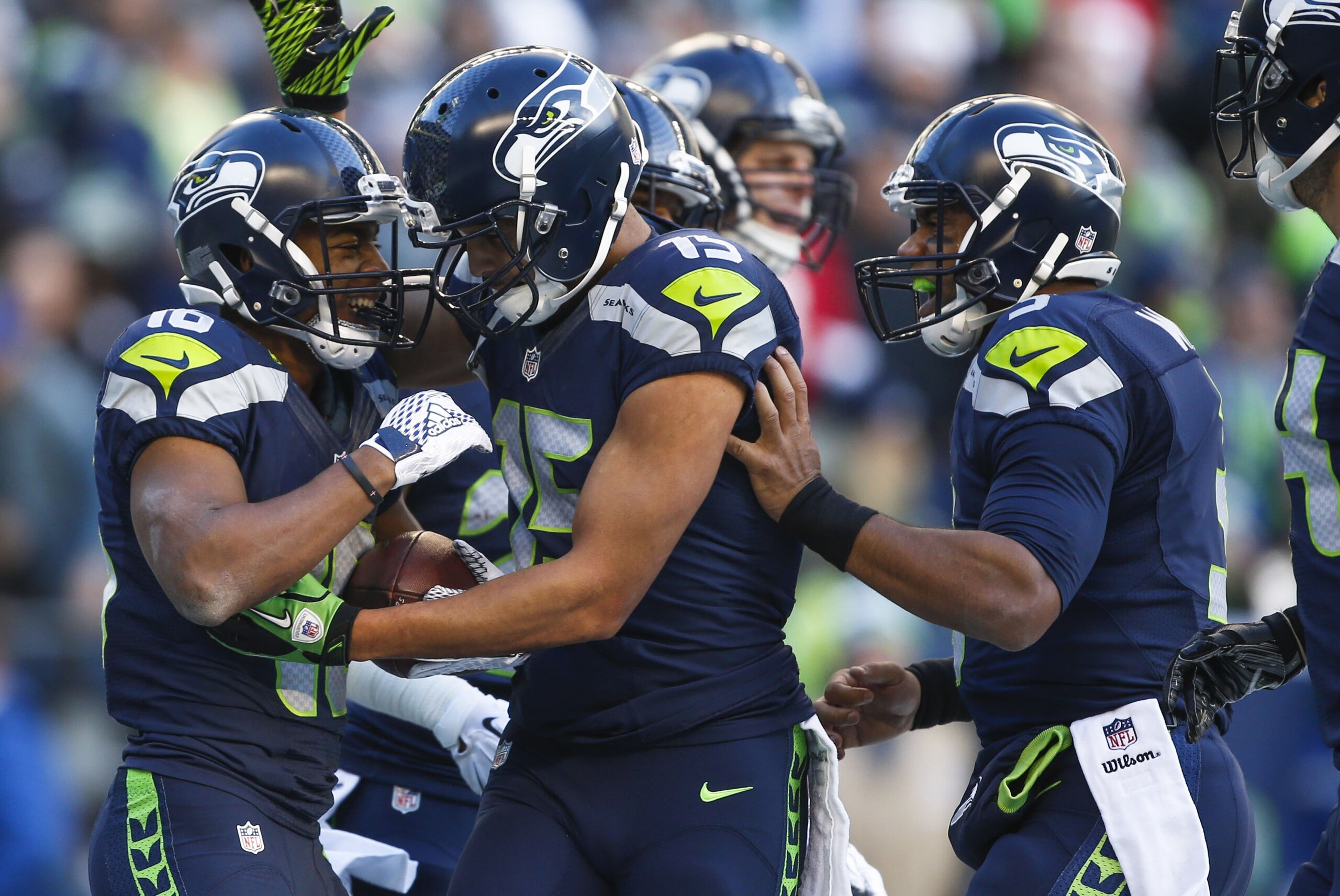 Nov 22, 2015; Seattle, WA, USA; Seattle Seahawks wide receiver Tyler Lockett (16) celebrates his touchdown reception against the San Francisco 49ers with wide receiver Jermaine Kearse (15) and quarterback Russell Wilson (3) during the second quarter at CenturyLink Field. Mandatory Credit: Joe Nicholson-USA TODAY Sports