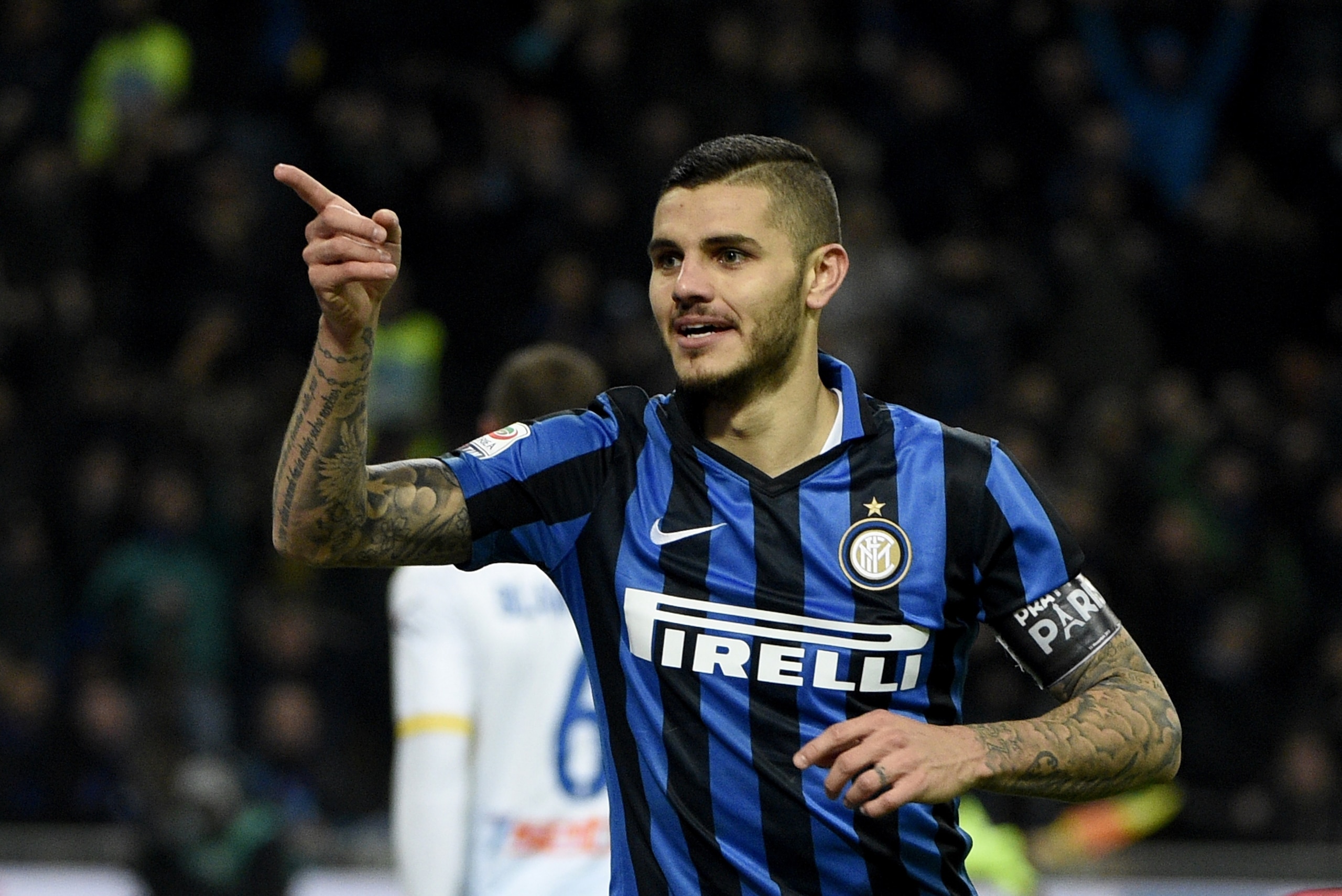 Inter Milan's forward from Argentina Mauro Icardi celebrates after scoring during the Italian Serie A football match Inter Milan vs Frosinone on November 22, 2015 at the San Siro Stadium stadium in Milan. AFP PHOTO / OLIVIER MORIN        (Photo credit should read OLIVIER MORIN/AFP/Getty Images)