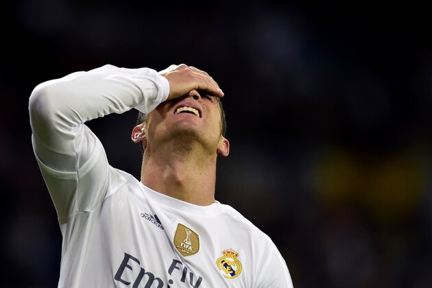 Real Madrid's Portuguese forward Cristiano Ronaldo gestures during the Spanish league 'Clasico' football match Real Madrid CF vs FC Barcelona at the Santiago Bernabeu stadium in Madrid on November 21, 2015. AFP PHOTO/ JAVIER SORIANO        (Photo credit should read JAVIER SORIANO/AFP/Getty Images)