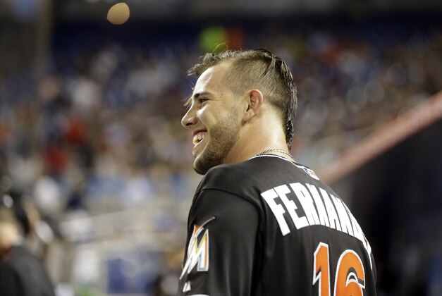 Miami Marlins starting pitcher Jose Fernandez watches from the dugout after pitching in the first inning of a baseball game against the Washington Nationals, Saturday, Sept. 12, 2015, in Miami.  (AP Photo/Lynne Sladky)