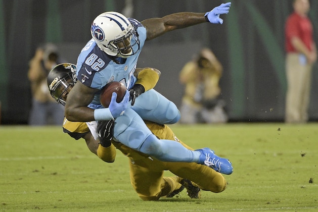 Tennessee Titans tight end Delanie Walker (82) is tackled by Jacksonville Jaguars strong safety Johnathan Cyprien after a short gain during the first half of an NFL football game in Jacksonville, Fla., Thursday, Nov. 19, 2015.(AP Photo/Phelan M. Ebenhack) Tennessee Titans tight end Delanie Walker (82) is tackled by Jacksonville Jaguars strong safety Johnathan Cyprien after a short gain during the first half of an NFL football game in Jacksonville, Fla., Thursday, Nov. 19, 2015.(AP Photo/Phelan M. Ebenhack)