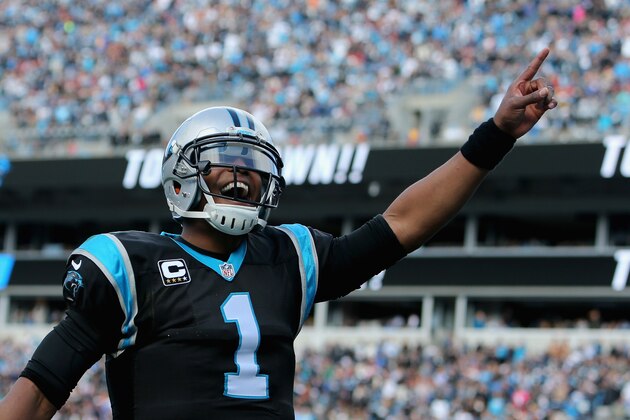 CHARLOTTE, NC - NOVEMBER 22:  Cam Newton #1 of the Carolina Panthers celebrates teammate Mike Tolbert's touchdown run against the Washington Redskins in the 1st quarter during their game at Bank of America Stadium on November 22, 2015 in Charlotte, North Carolina.  (Photo by Streeter Lecka/Getty Images)