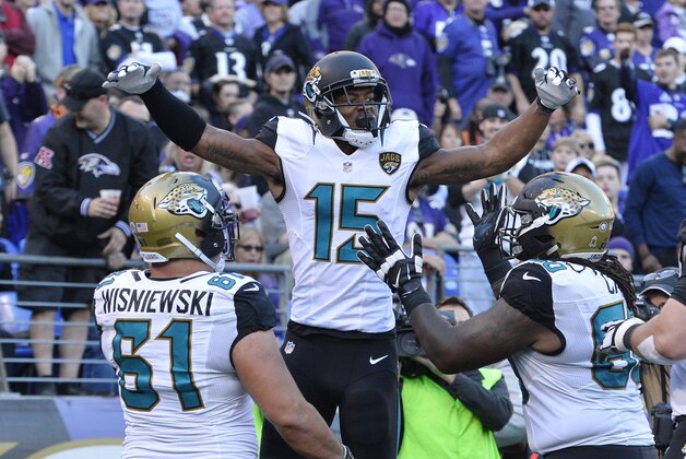 Nov 15, 2015; Baltimore, MD, USA; Jacksonville Jaguars wide receiver Allen Robinson (15) celebrates with teammates after catching a touchdown pass during the fourth quarter against the Baltimore Ravens at M&T Bank Stadium. Mandatory Credit: Tommy Gilligan-USA TODAY Sports