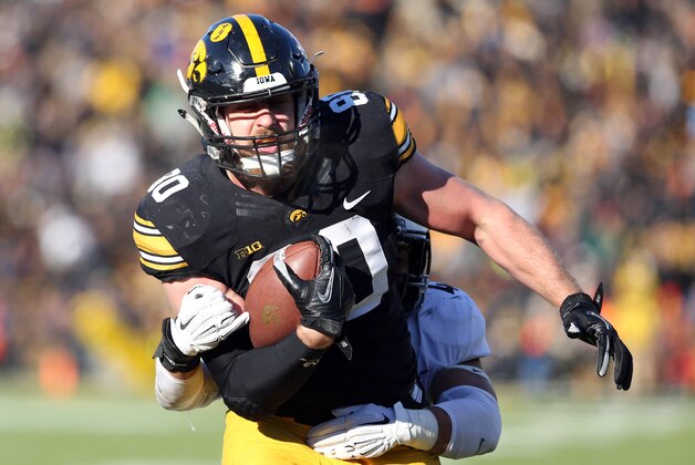 Nov 21, 2015; Iowa City, IA, USA; Iowa Hawkeyes tight end Henry Krieger Coble (80) runs in for a touchdown against the Purdue Boilermakers in the fourth quarter at Kinnick Stadium. Iowa beat Purdue 40-20. Mandatory Credit: Reese Strickland-USA TODAY Sports